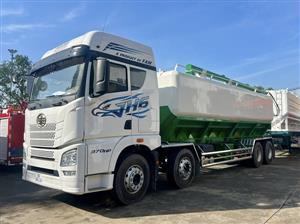 Xe bồn chở thức ăn chăn nuôi 29 khối FAW bơm trục vít tải